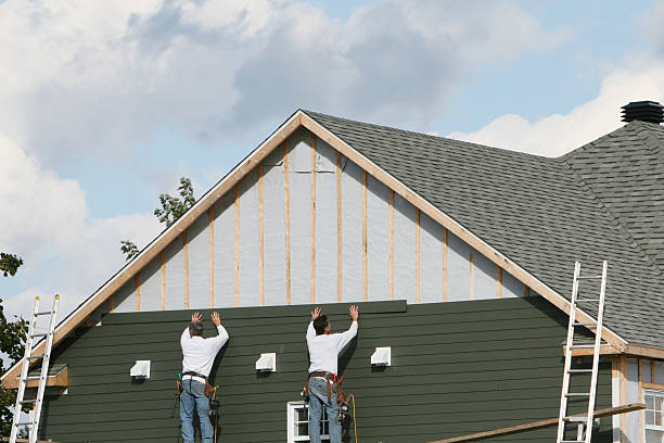 Professional Storm Damage Siding Repair technician working in New Castle, CO